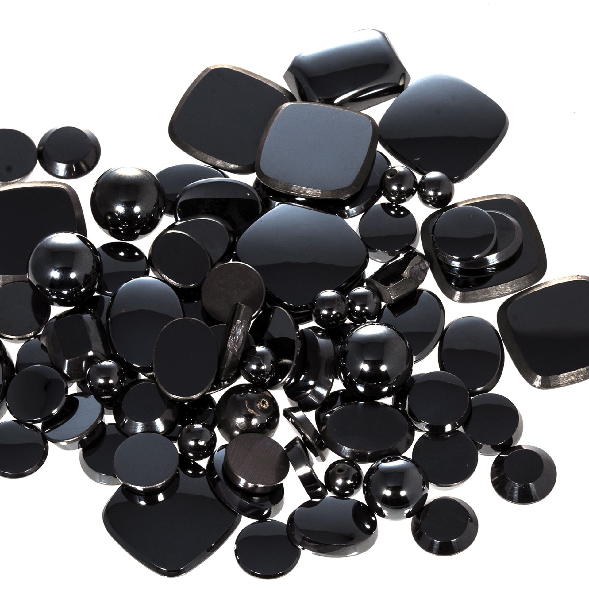 A 617 CARAT PARCEL OF HEMATITE variously shaped and sized, beads and cabochons.