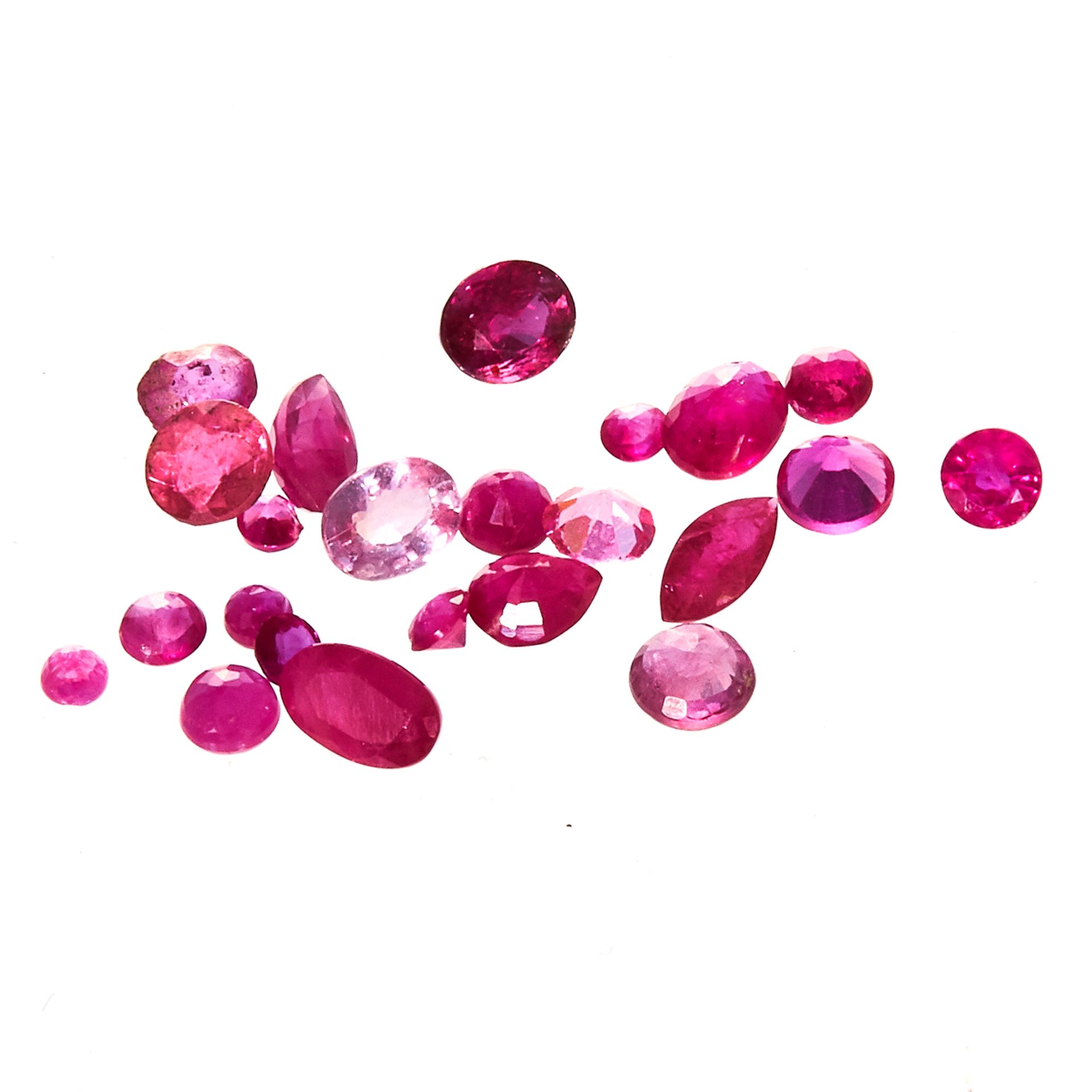 A 3.60 CARAT PARCEL OF RUBIES various shapes and sizes.