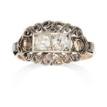 AN ANTIQUE DIAMOND DRESS RING in yellow gold and silver, set with two old cut diamonds and two