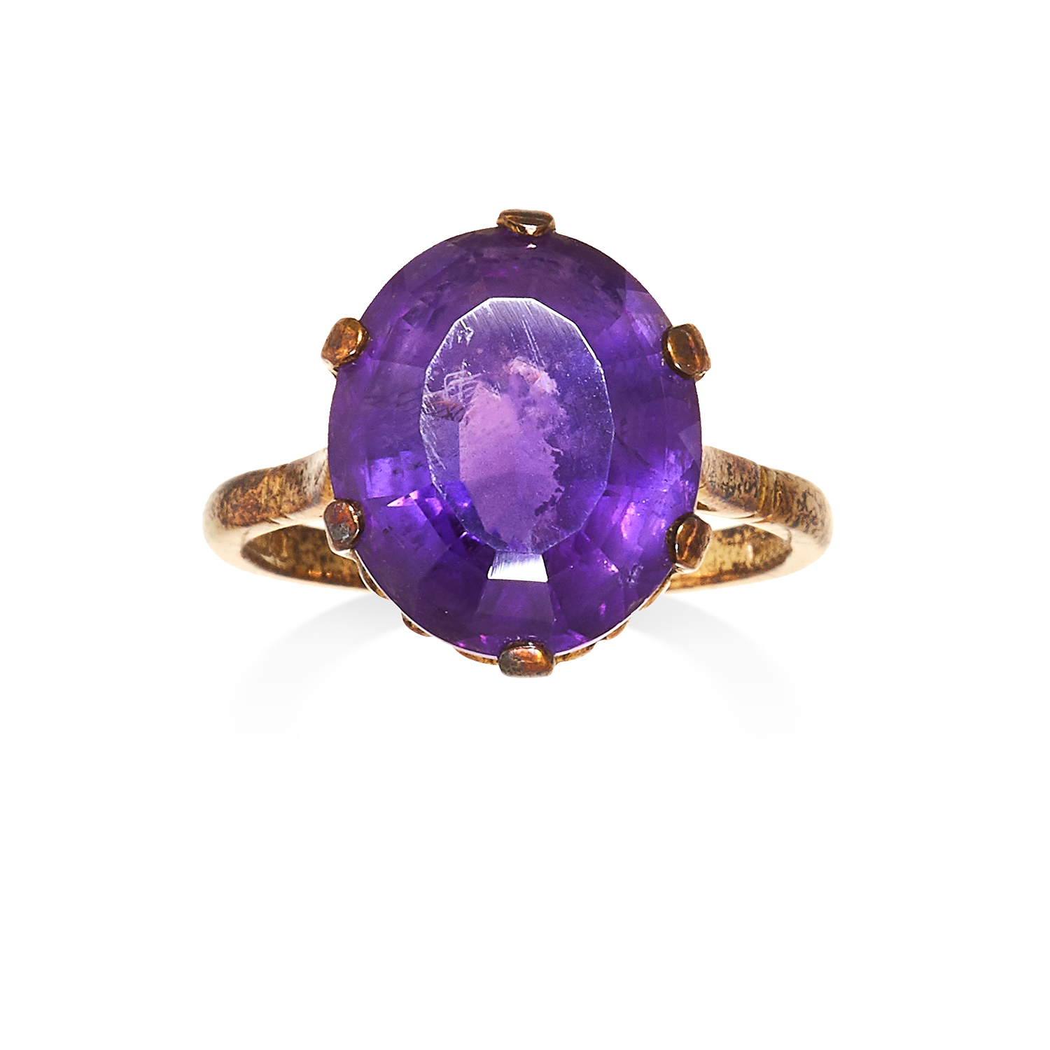 AN AMETHYST DRESS RING yellow gold set with an oval cut amethyst, full British hallmarks, size O /