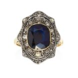 AN ANTIQUE SAPPHIRE AND DIAMOND DRESS RING set with a central cushion cut sapphire of 2.86 carats