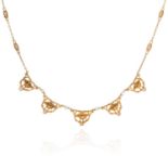 AN ART NOUVEAU PEARL NECKLACE in high carat yellow gold, comprising fancy links punctuated with