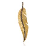 A DIAMOND FEATHER PENDANT in silver, designed as a feather motif jewelled with diamonds, stamped