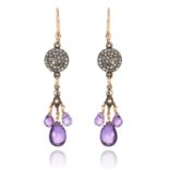 A PAIR OF AMETHYST AND DIAMOND DROP EARRINGS each suspending a trio of flattened briolette cut