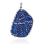 A LARGE LAPIS LAZULI PENDANT in sterling silver, set with large rough cut slice of lapis lazuli,