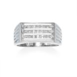 A DIAMOND DRESS RING in 9ct white gold, set with three rows of round cut diamonds totalling