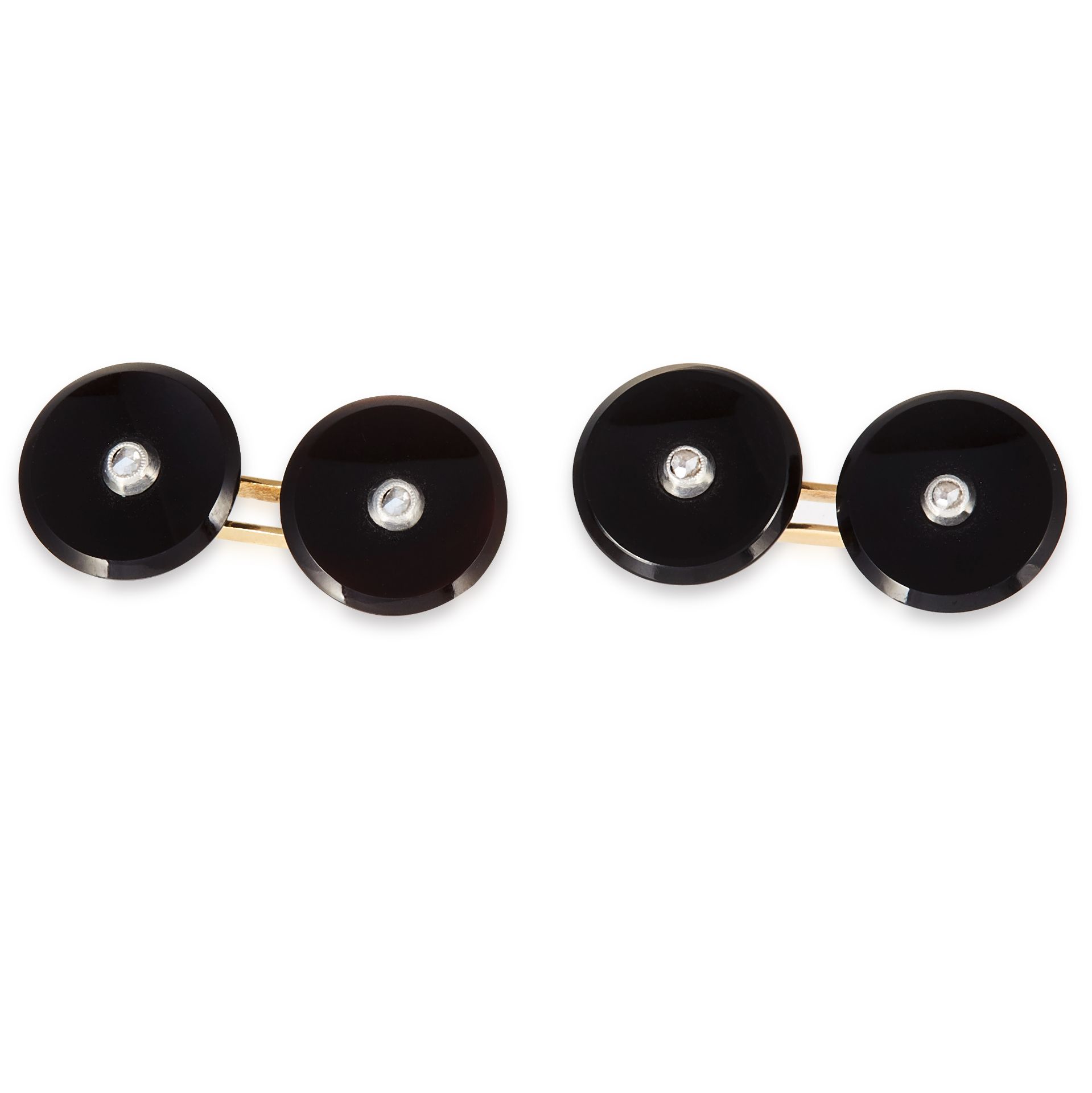 A PAIR OF ART DECO DIAMOND AND ONYX CUFFLINKS in yellow gold, each formed of two circular polished