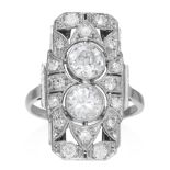 AN ART DECO DIAMOND RING CIRCA 1940 in platinum or white gold, set with two round cut diamonds of