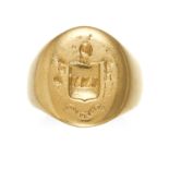 AN INTAGLIO SEAL SIGNET RING in high carat yellow gold, the oval face with a reverse engraved coat