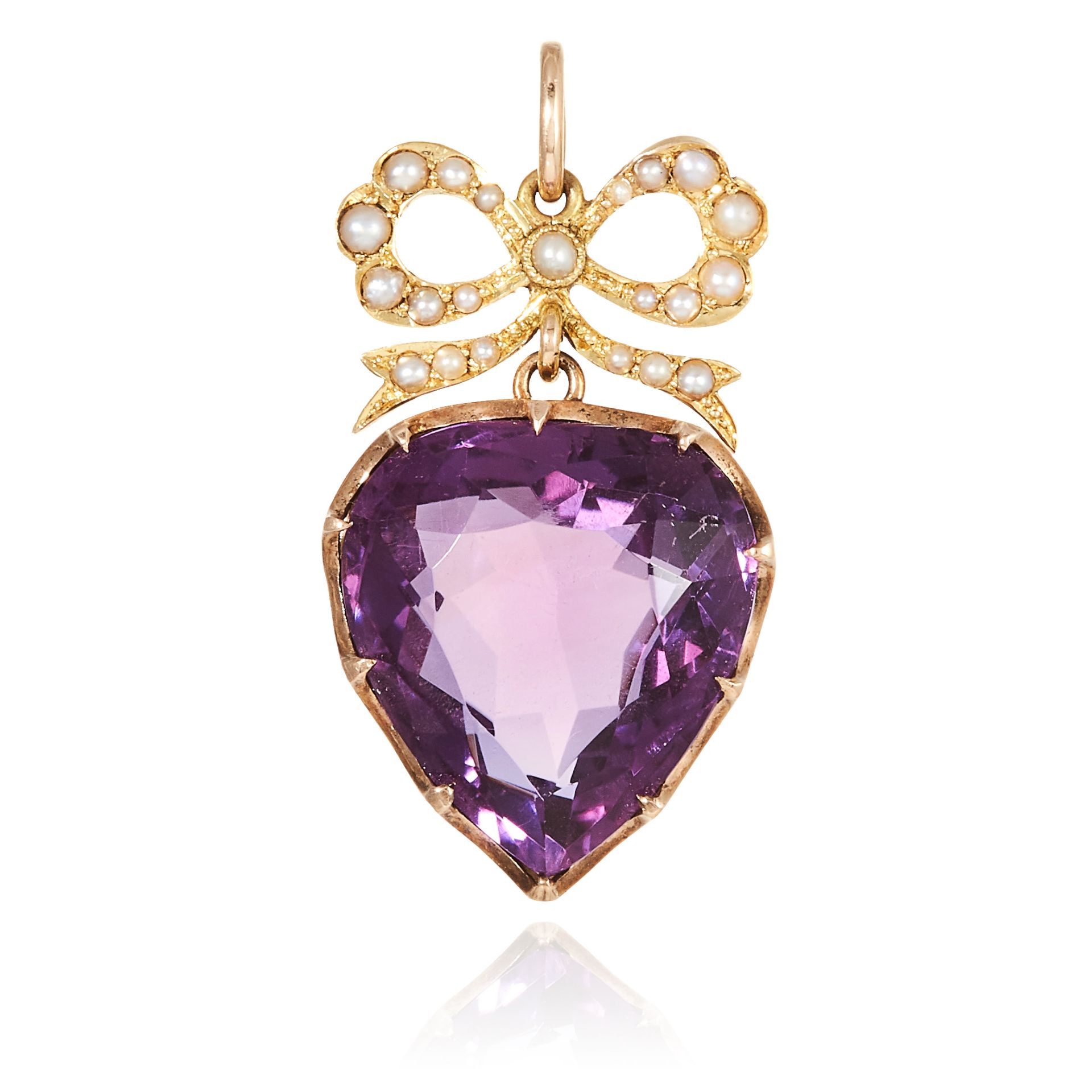 AN ANTIQUE AMETHYST AND PEARL SWEETHEART PENDANT in yellow gold, comprising of ribbon and bow