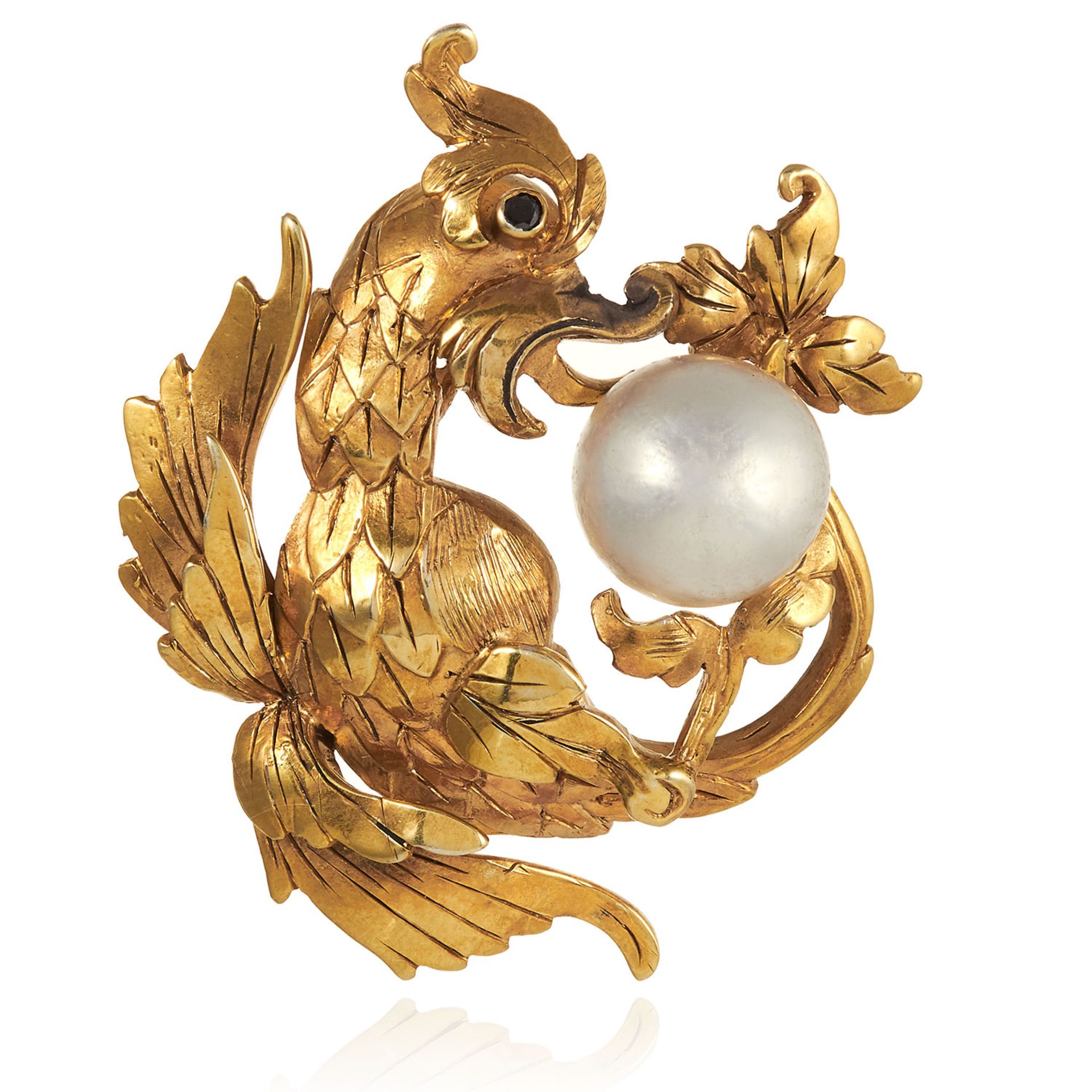 A PEARL DRAGON PENDANT in silver gilt, depicting a Chinese dragon with a jewelled eye cradling a