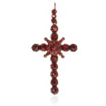 A GARNET CROSS PENDANT, 19TH CENTURY in yellow gold or silver, jewelled with rose cut garnets in