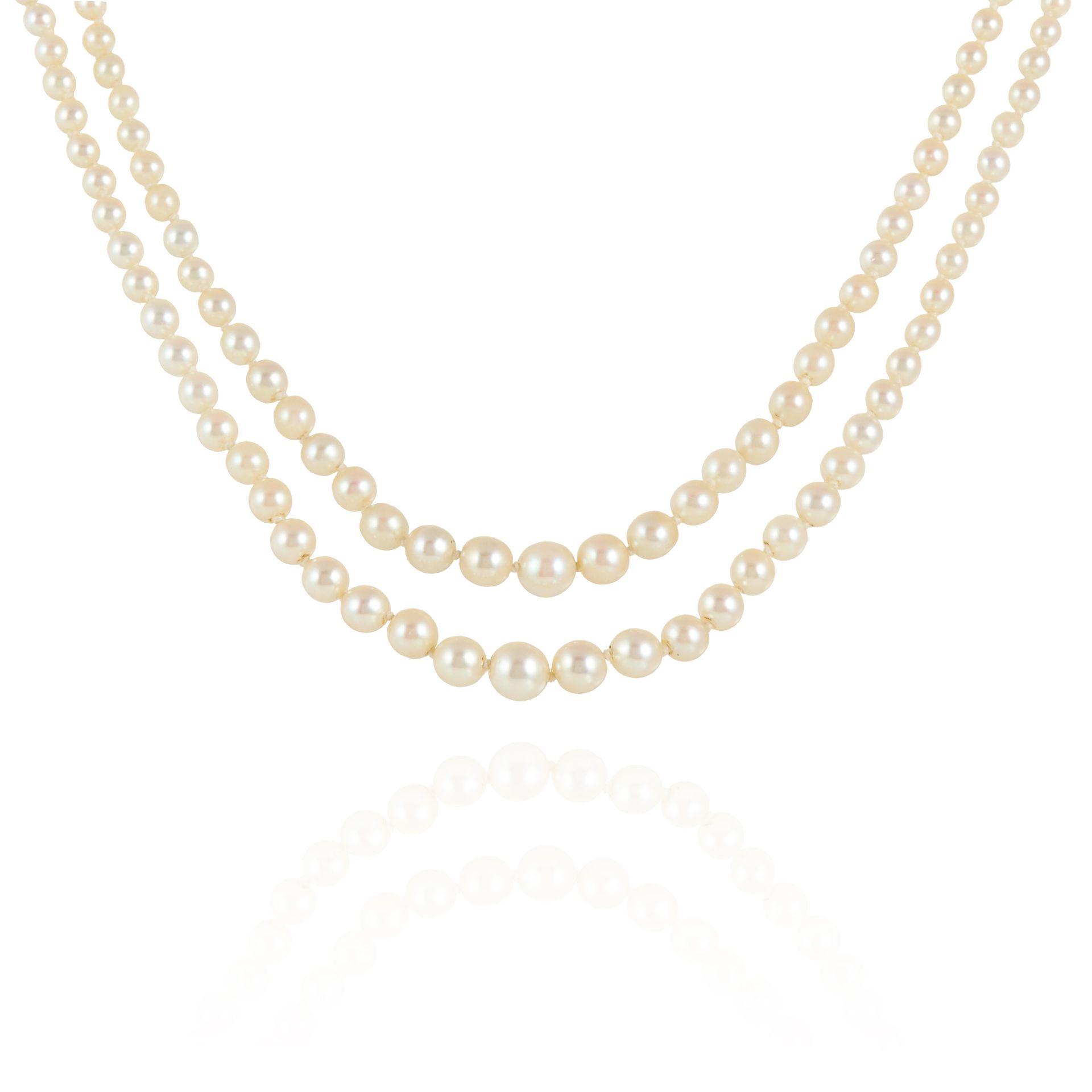 A TWO ROW PEARL AND DIAMOND NECKLACE in gold or platinum, comprising two rows of one-hundred and