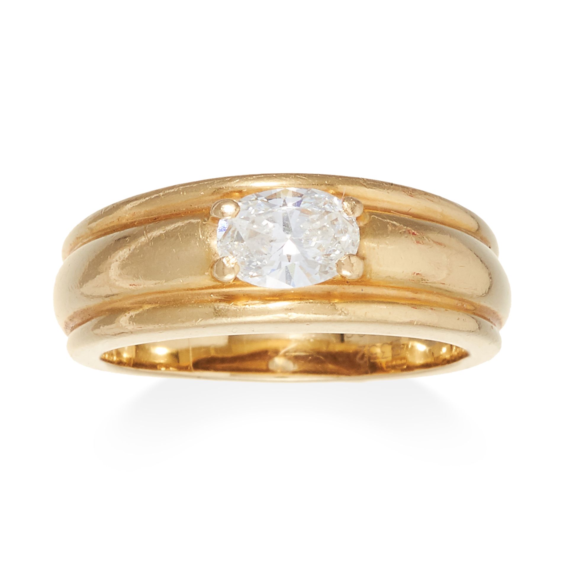 A DIAMOND RING, BOUCHERON in 18ct yellow gold, jewelled with an oval cut diamond of approximately