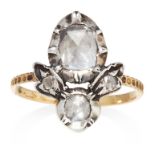 AN ANTIQUE DIAMOND RING, CIRCA 1800 in yellow gold and silver, set with a rose cut diamond within an