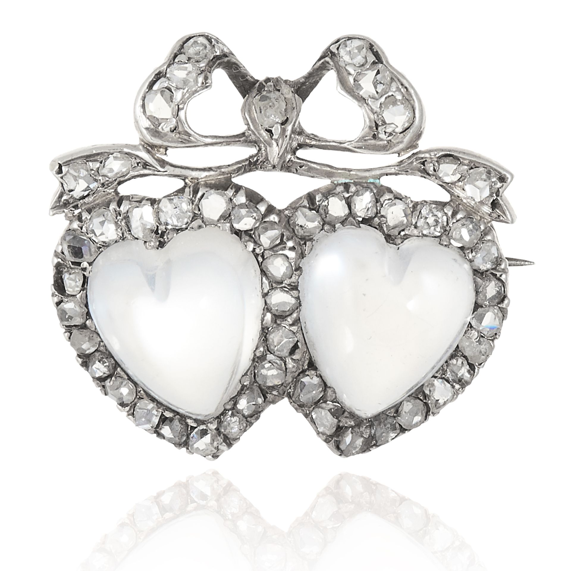 AN ANTIQUE MOONSTONE AND DIAMOND SWEETHEART BROOCH in yellow gold, set with two heart-shaped