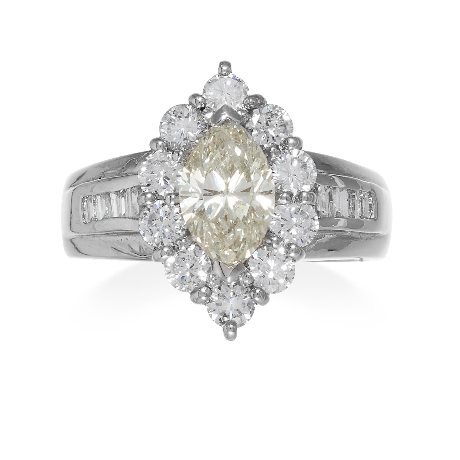 A DIAMOND DRESS RING in platinum, comprising of a marquise cut diamond framed by a border of round