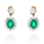 A PAIR OF EMERALD AND DIAMOND CLUSTER EARRINGS, in yellow gold, each comprising of a round cut