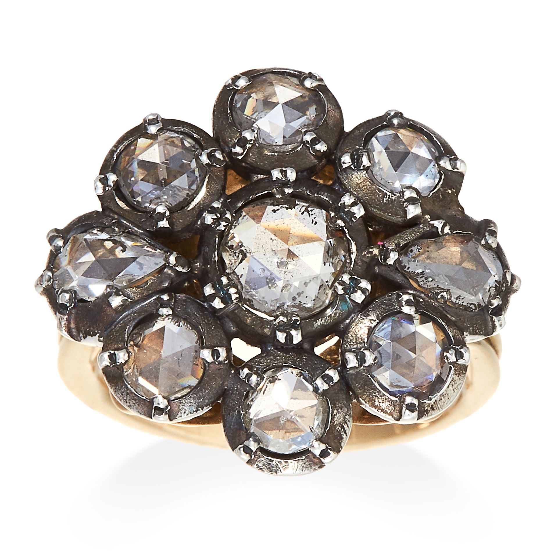 AN ANTIQUE DIAMOND CLUSTER RING in yellow gold and silver, set with a cluster of nine rose cut