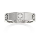 A DIAMOND LOVE RING, CARTIER in 18ct white gold, punctuated with screw head motifs, three jewelled