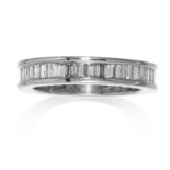 A DIAMOND ETERNITY RING in gold or platinum, jewelled with emerald cut diamonds, unmarked, size