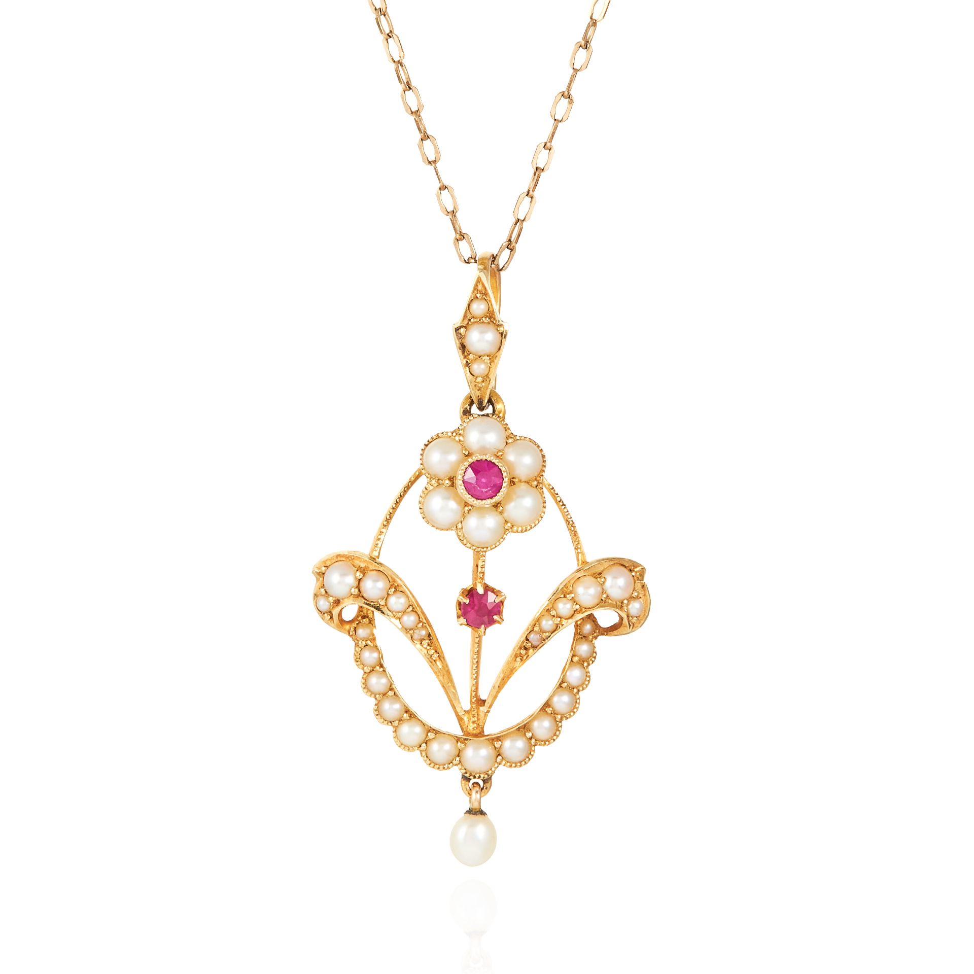 AN ANTIQUE PEARL AND RUBY PENDANT in 15 carat yellow gold gold, comprising of floral motif