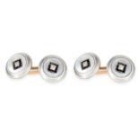 A PAIR OF ANTIQUE DIAMOND ONYX AND MOTHER OF PEARL CUFFLINKS in 18ct yellow gold, each with a carved