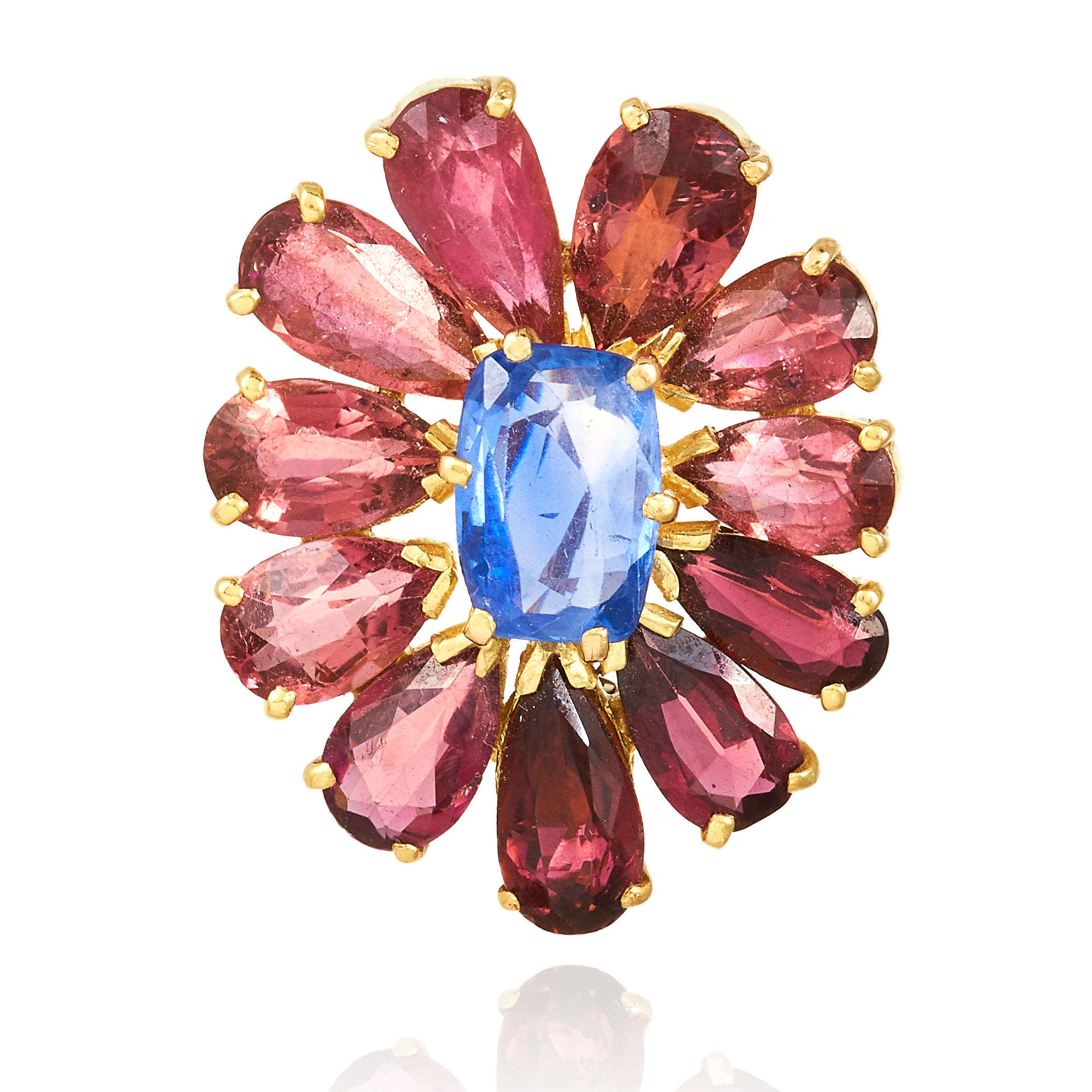 AN CEYLON NO HEAT SAPPHIRE AND TOURMALINE BROOCH in high carat yellow gold, set with an oval cut