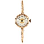 AN ANTIQUE GOLD LADIES WRIST WATCH in 14ct yellow gold, on thin fancy link chain, marked