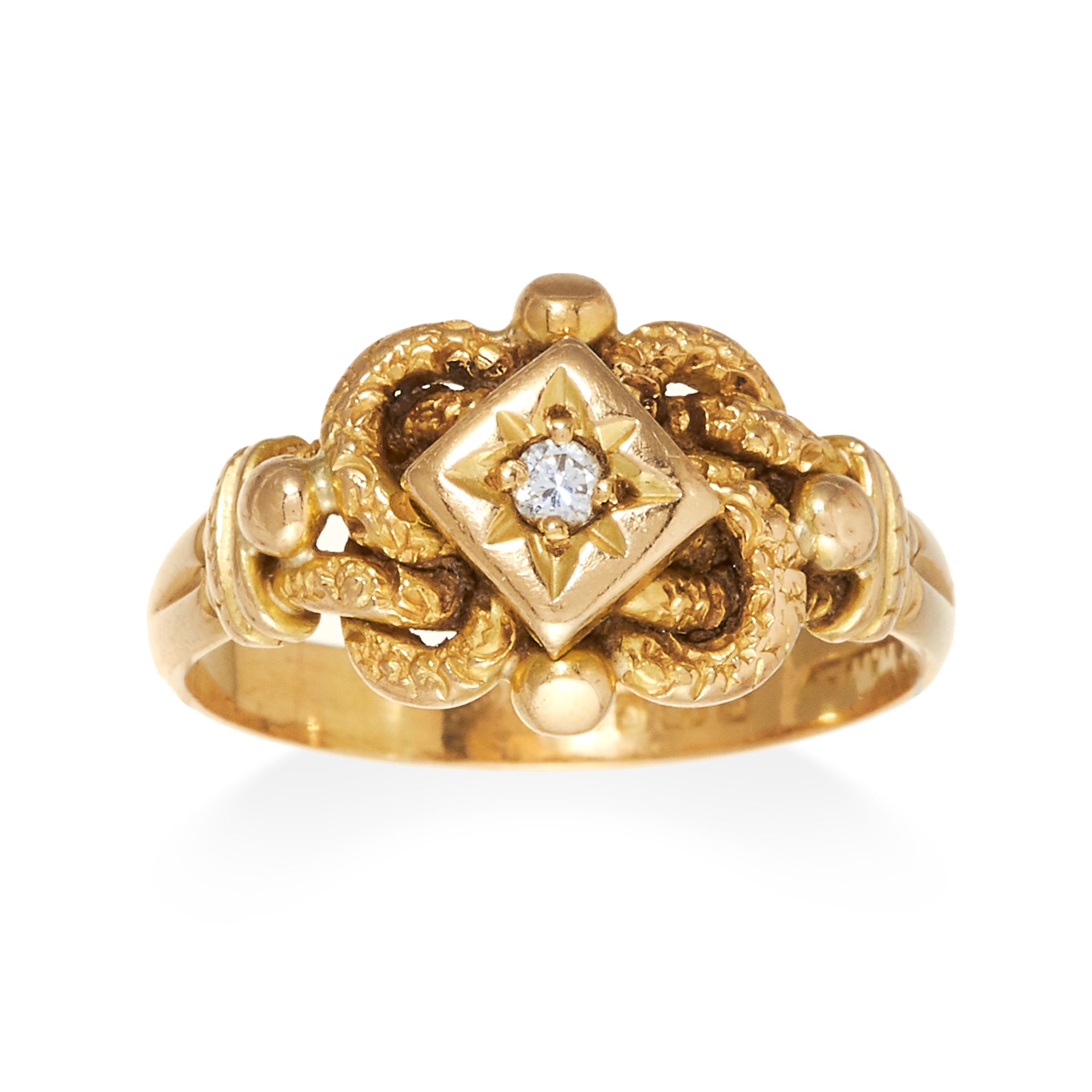 AN ANTIQUE DIAMOND RING in 18ct yellow gold, set with a central round cut diamond within wire work