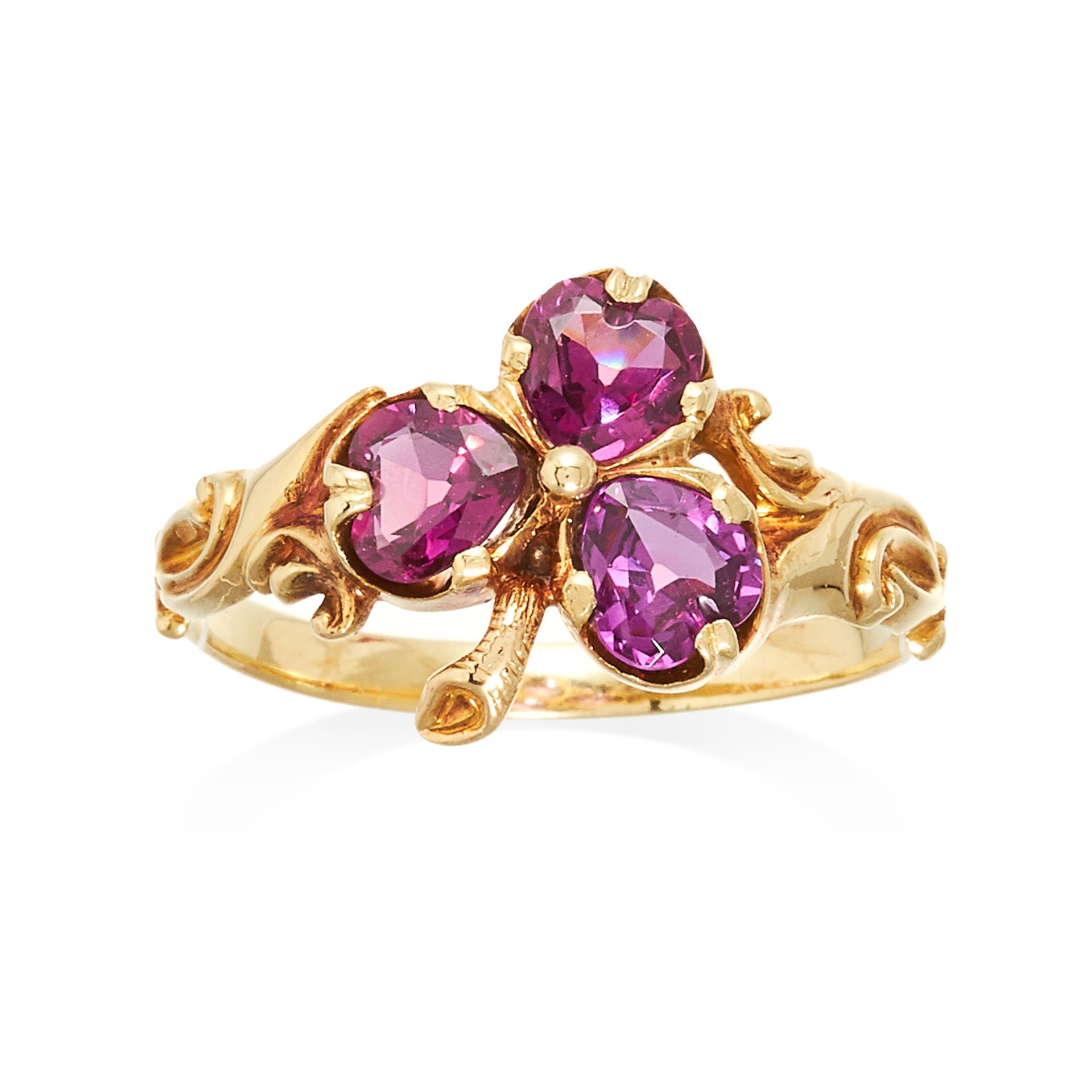 AN AMETHYST CLOVER RING, in high carat yellow gold, set with three pear cut amethysts totalling