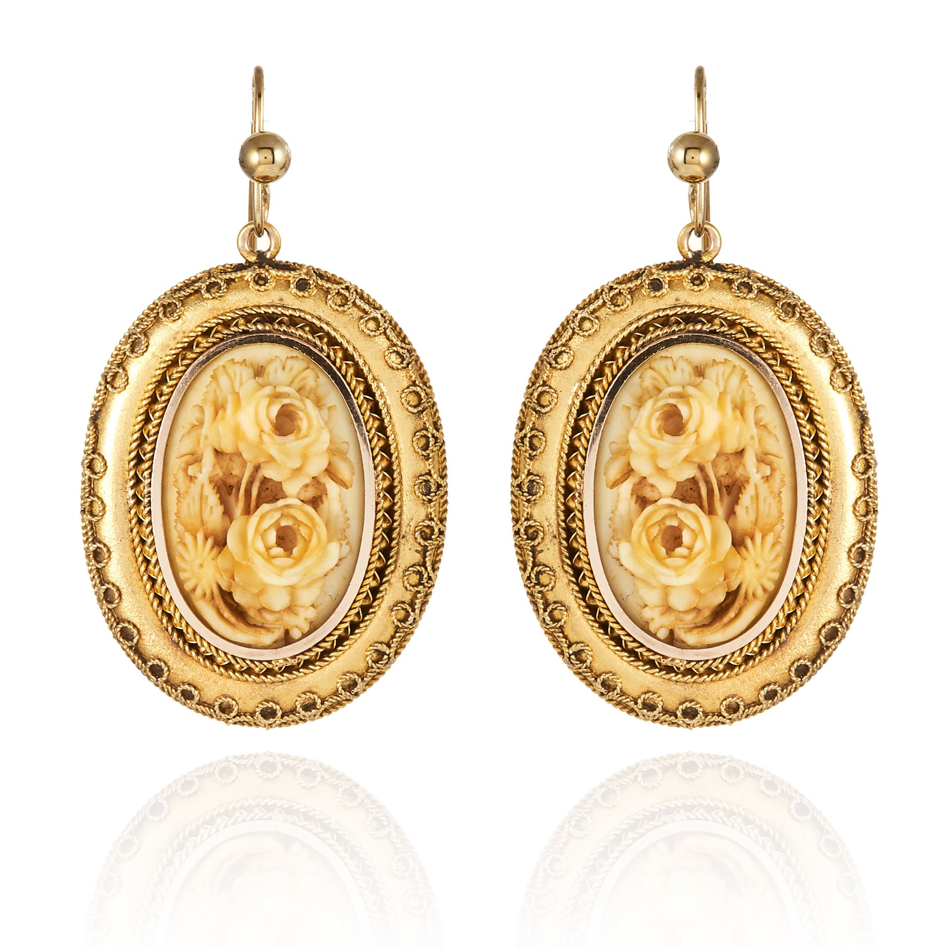 A PAIR OF ANTIQUE CARVED IVORY EARRINGS, in high carat yellow gold, comprising of an ornate gold