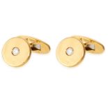 A PAIR OF DIAMOND CUFFLINKS in 18ct yellow gold, the circular face jewelled with a round cut diamond