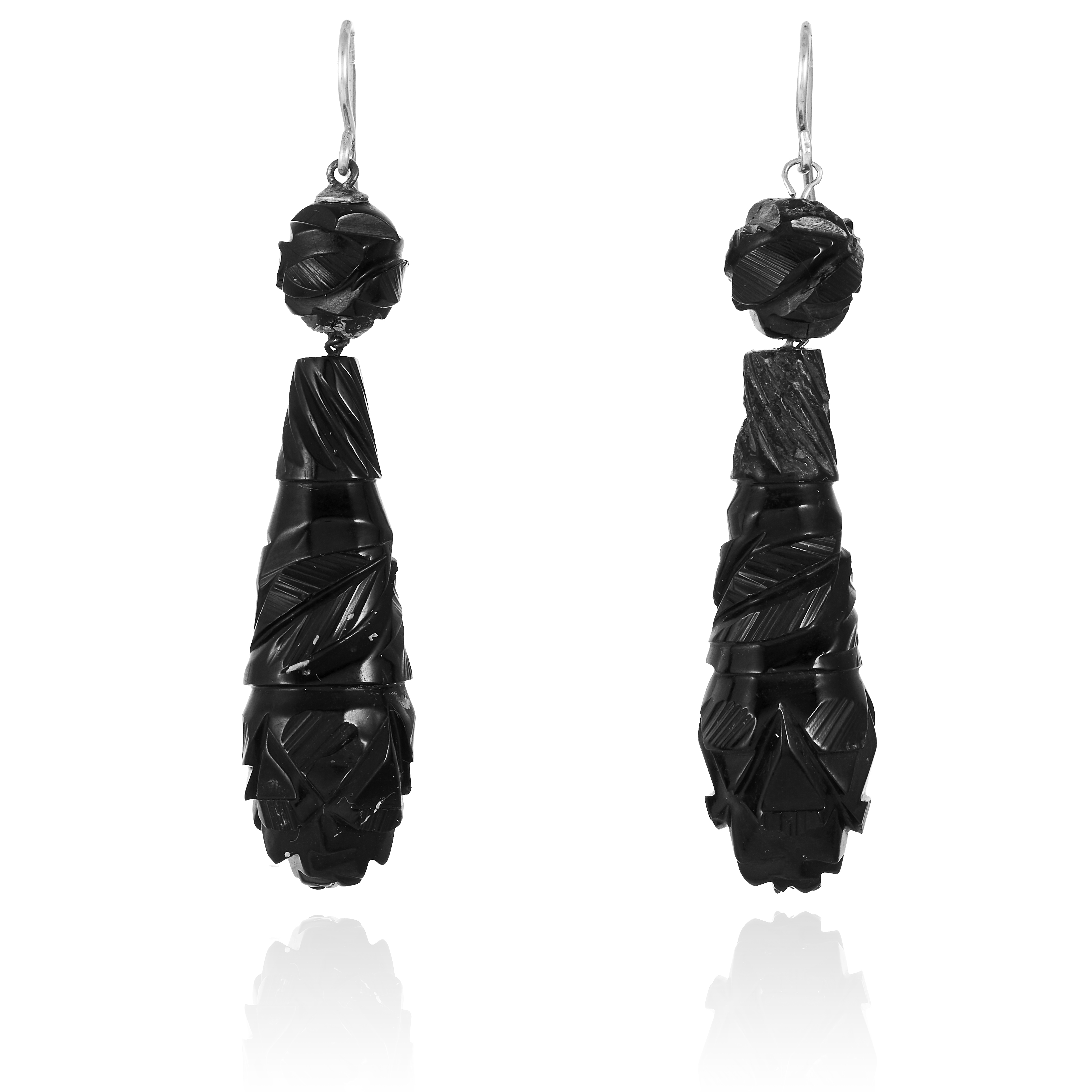 A PAIR OF ANTIQUE WHITBY JET EARRINGS, 19TH CENTURY each formed of a carved tapering drop of jet,