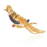 A SAPPHIRE, RUBY AND DIAMOND BIRD BROOCH, KUTCHINSKY, CIRCA 1977 in 18ct yellow gold, the body