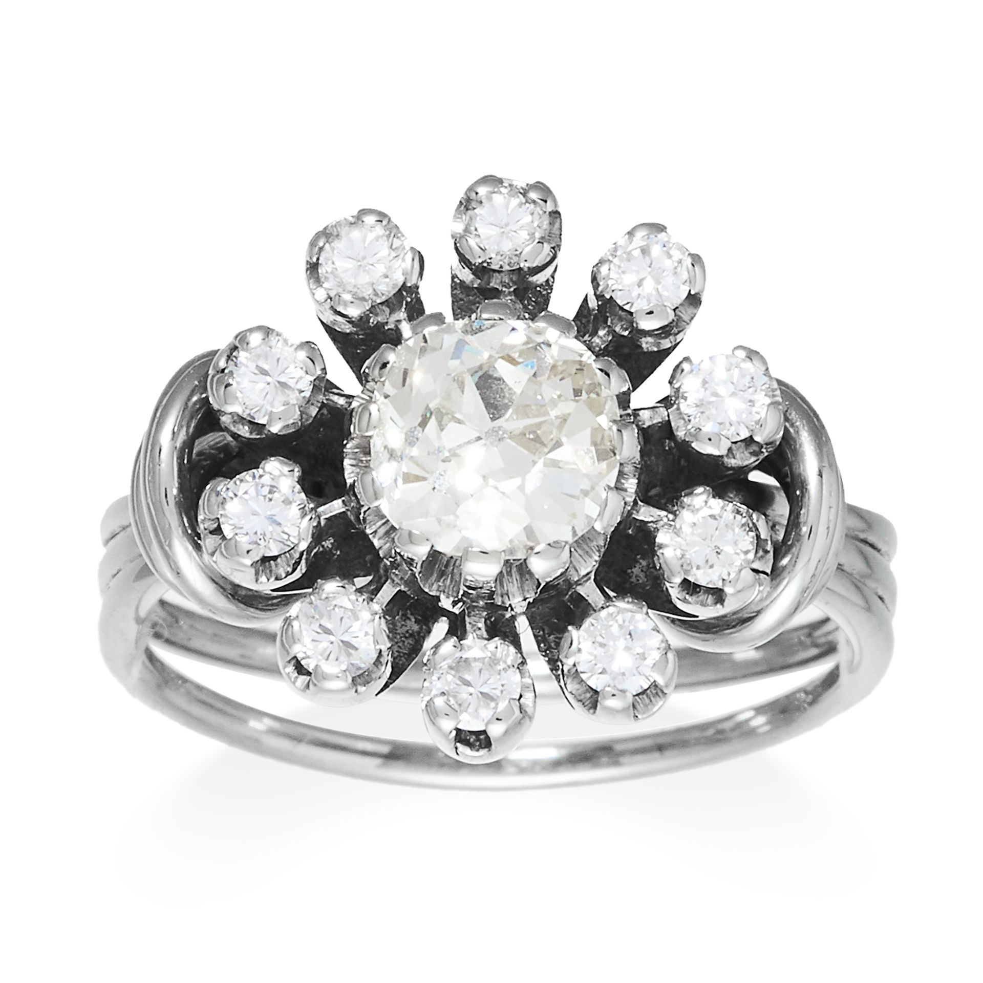 A DIAMOND CLUSTER DRESS RING in platinum or white gold, set with an old cut diamond of 1.20 carats
