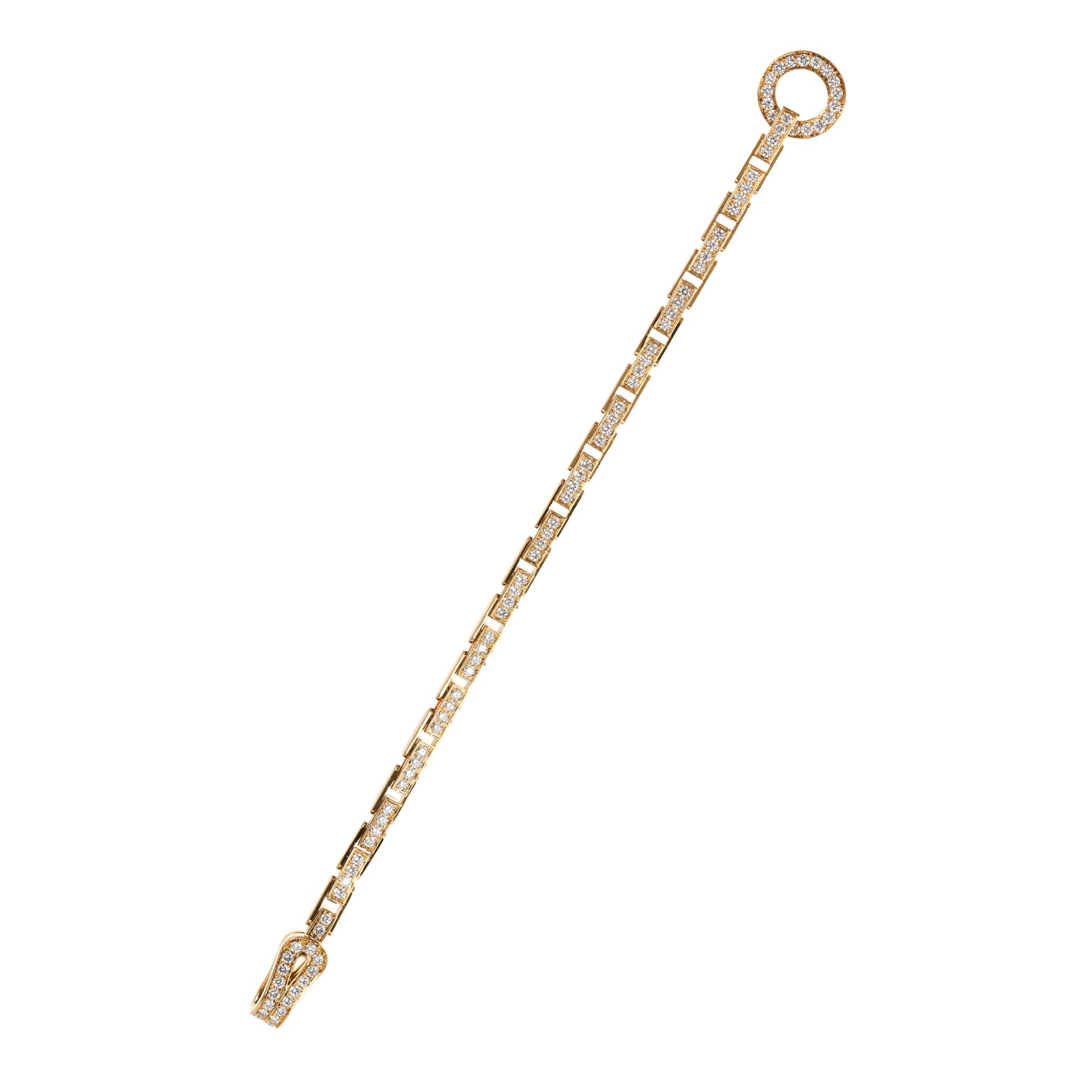 A DIAMOND AGRAFE BRACELET, CARTIER in 18 carat yellow gold, jewelled with round cut diamonds