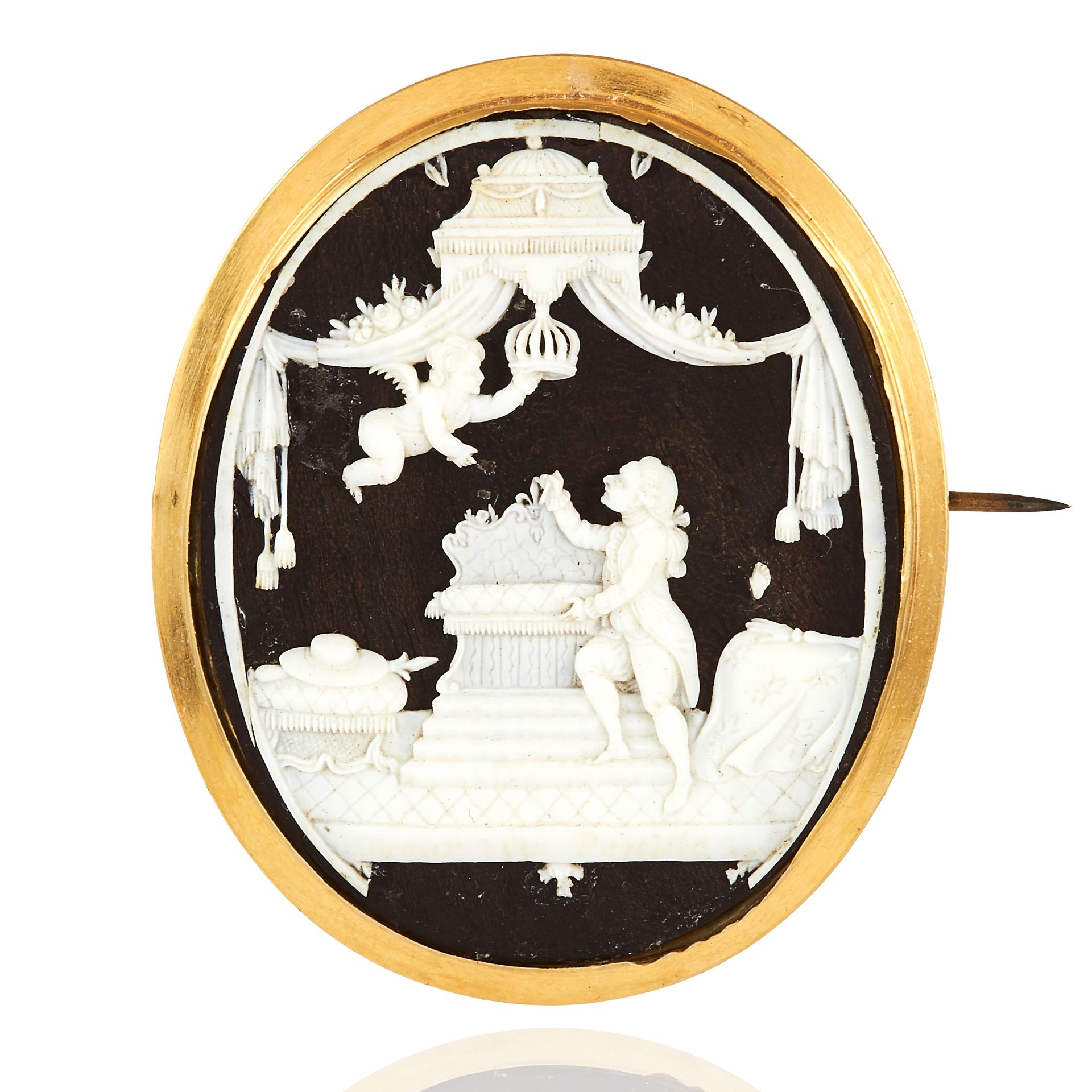 AN ANTIQUE IVORY MINIATURE BROOCH yellow gold, comprising of oval ebony in gold mount and a