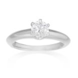 A 0.52 CARAT SOLITAIRE DIAMOND RING, TIFFANY & CO in platinum, set with a brilliant cut diamond of