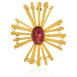 A VINTAGE TOURMALINE CROSS BROOCH in 18ct yellow gold, set with a central cabochon tourmaline,