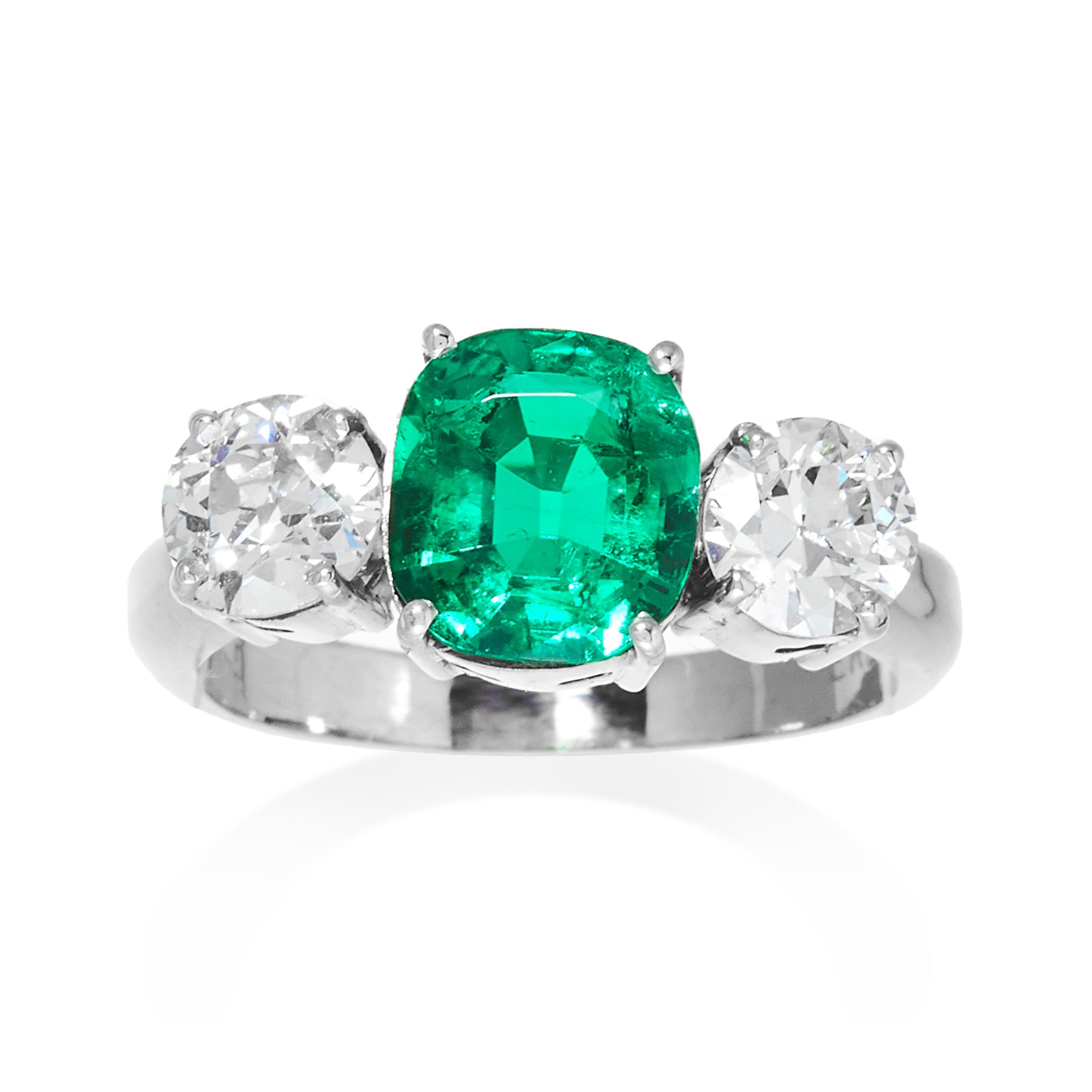 A COLOMBIAN EMERALD AND DIAMOND RING in white gold or platinum, the 1.42 carat cushion cut emerald