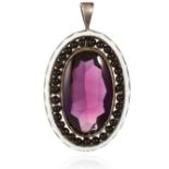 AN AMETHYST, ONYX AND ENAMEL PENDANT in sterling silver, comprising of a central oval cut amethyst