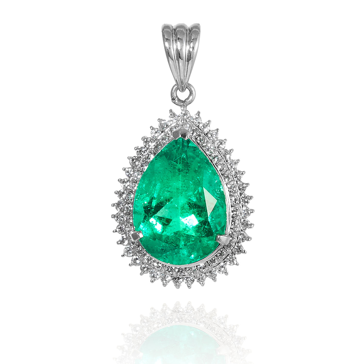 A 6 CARAT COLUMBIAN EMERALD PENDANT in platinum, set with a central pear cut Columbian moderate heat