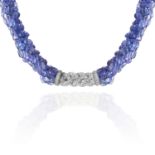 A DIAMOND AND SAPPHIRE BEAD NECKLACE in 18ct gold, comprising of seven rows of faceted sapphire