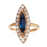 A SAPPHIRE AND DIAMOND DRESS RING, VICTORIAN in yellow gold, set with a marquise cut sapphire in a