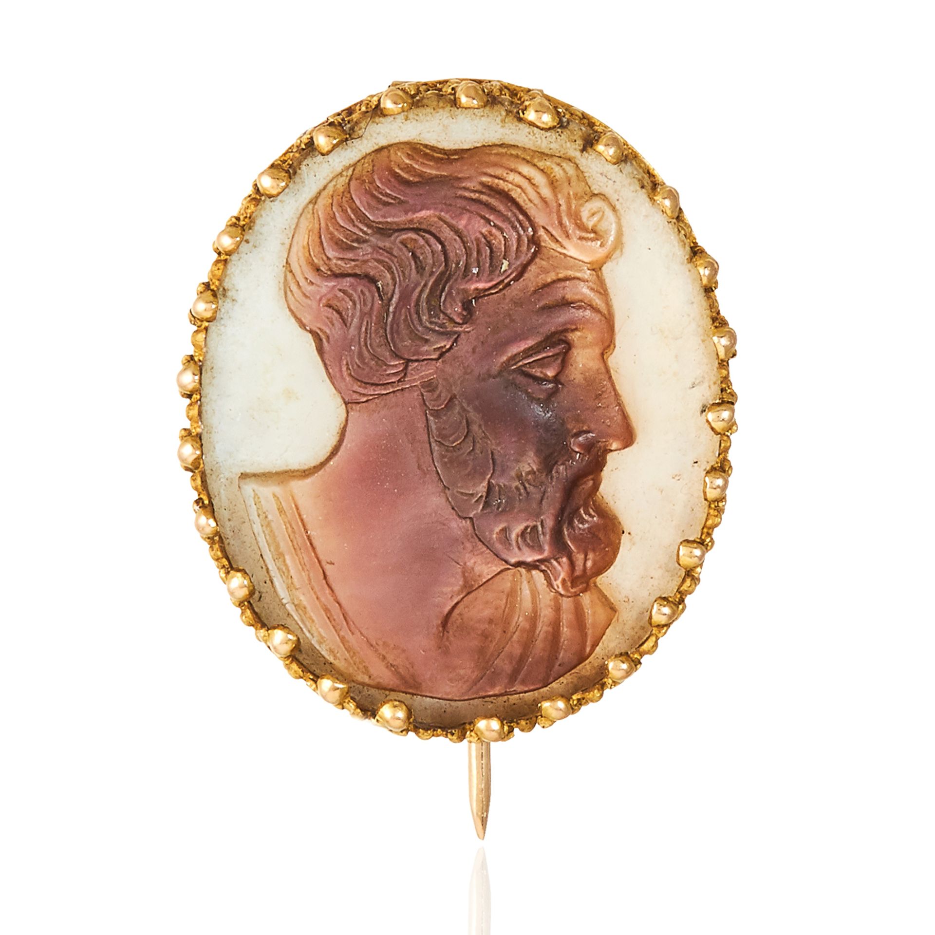 AN ANTIQUE SHELL CAMEO in high carat yellow gold, depicting a Roman man in detailed gold frame,