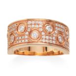 A DIAMOND DRESS RING in 18ct rose gold, jewelled with round cut diamonds, stamped 750, size N / 6.5,
