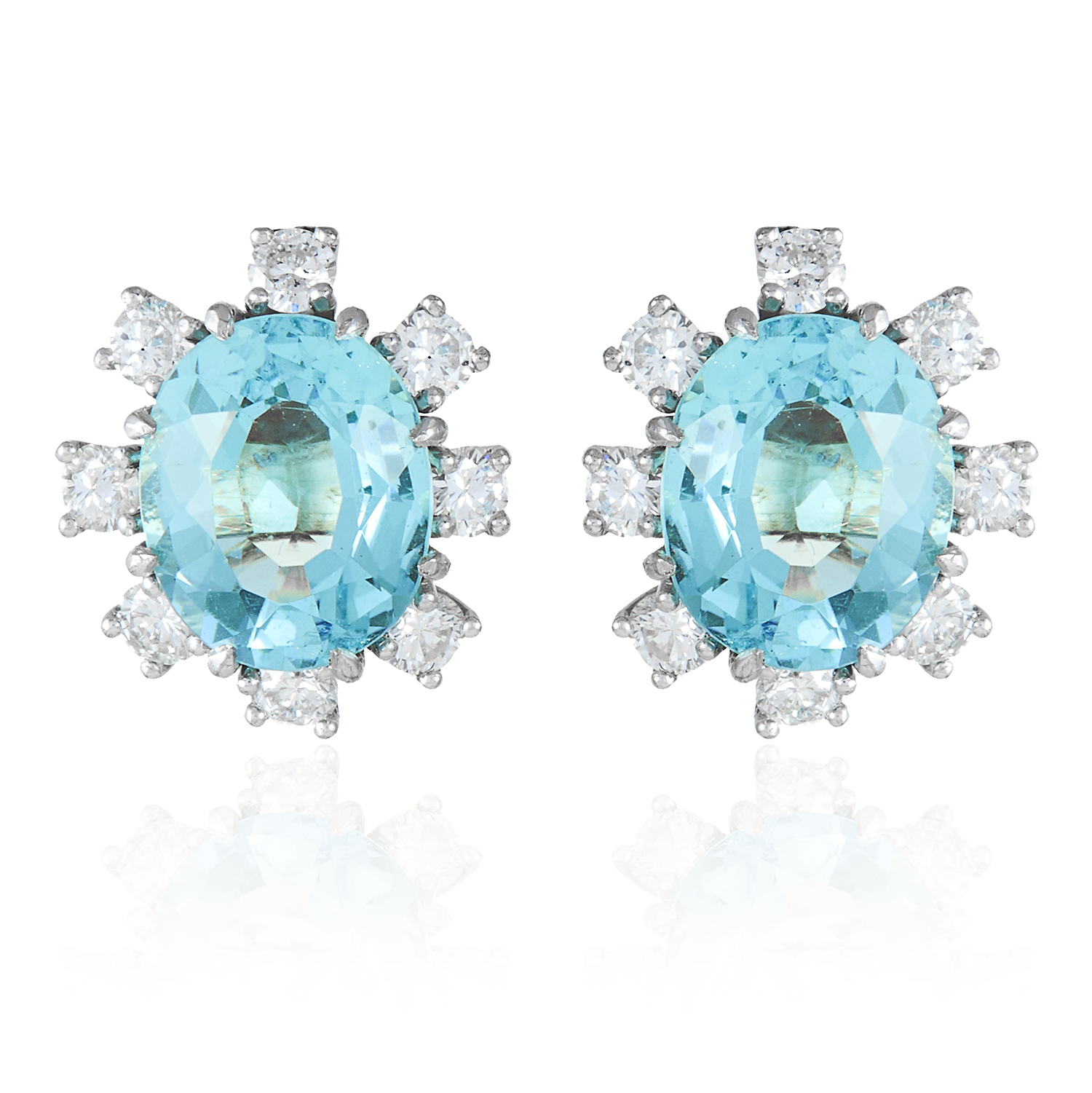 A PAIR OF AQUAMARINE AND DIAMOND STUD EARRINGS in 18ct white gold, each oval cut aquamarine