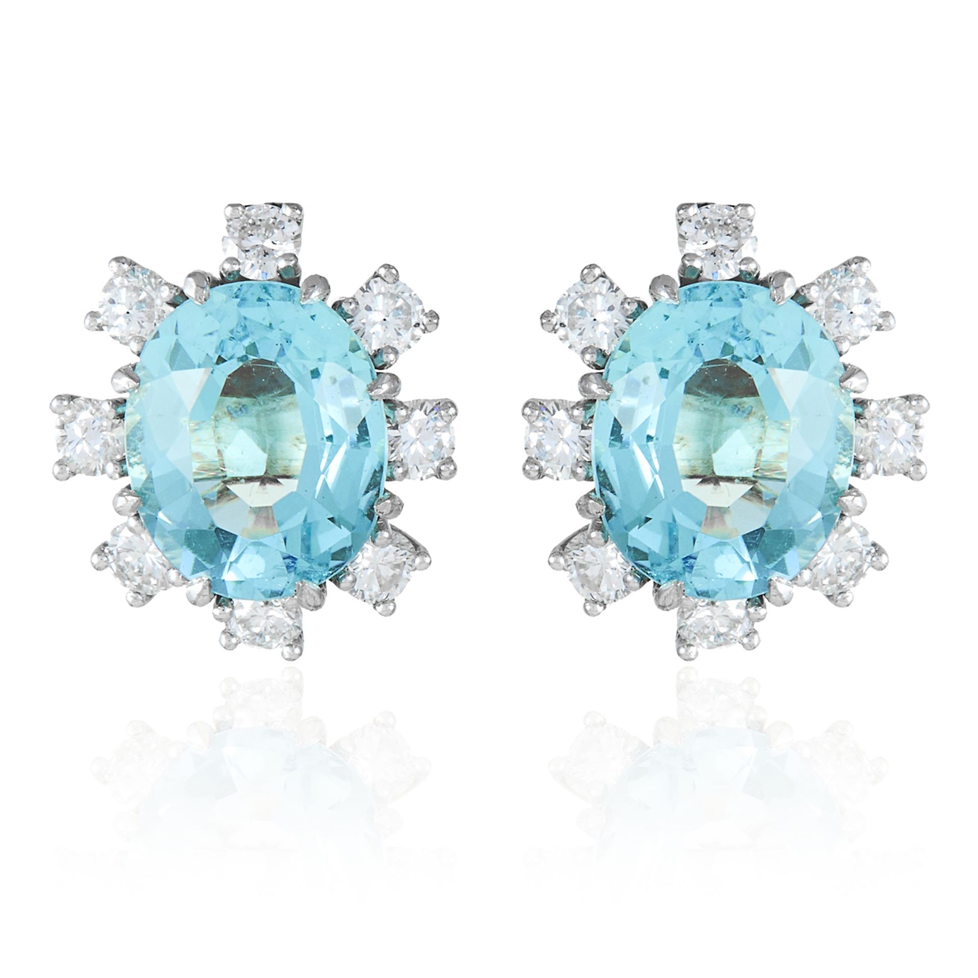 A PAIR OF AQUAMARINE AND DIAMOND STUD EARRINGS in 18ct white gold, each oval cut aquamarine