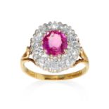 A BURMA RUBY CLUSTER RING in 18ct yellow gold, set with a round cut ruby of approximately 1.08